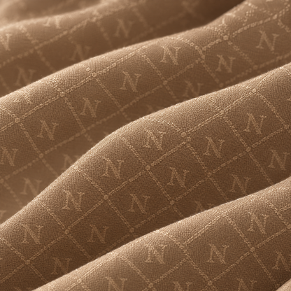 Detail tenun jacquard monogram N Nuréa Monogram Series, warna Beige